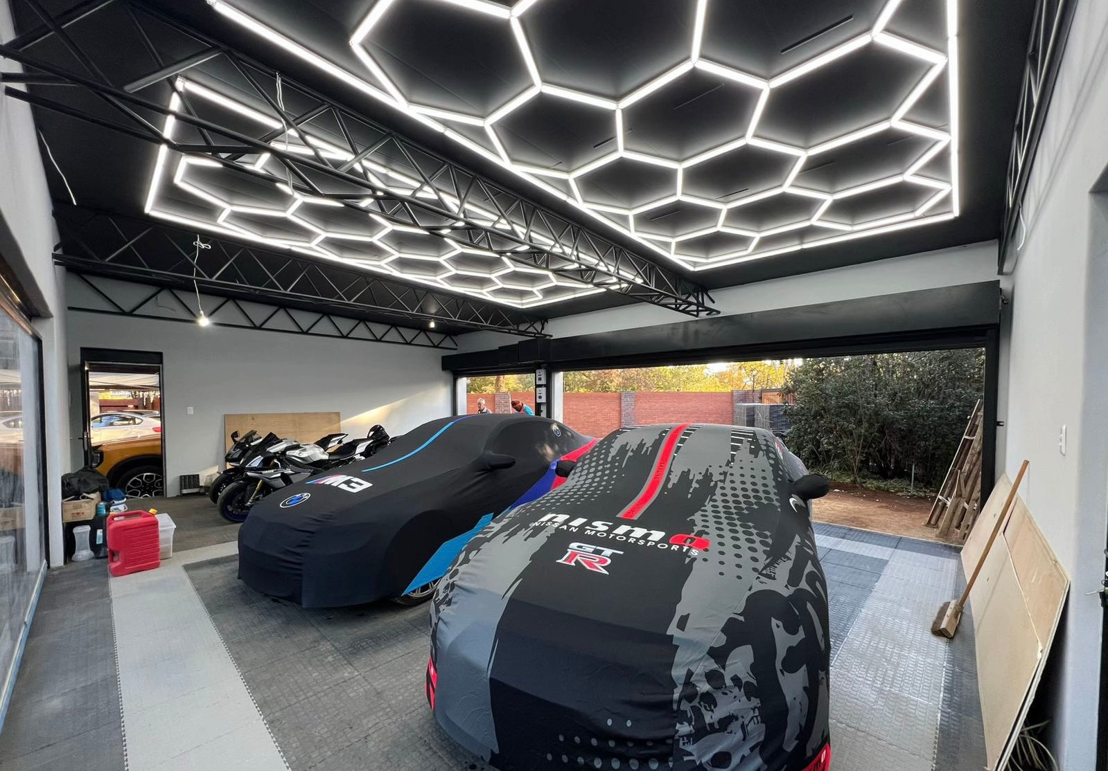 HexLEDLighting 15grid with border Hexagon LED Lights illuminating a double-car garage