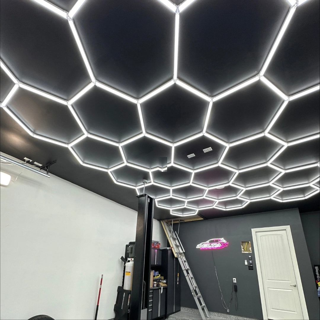 HEXLED hexagon LED lights on a garage workshop ceiling