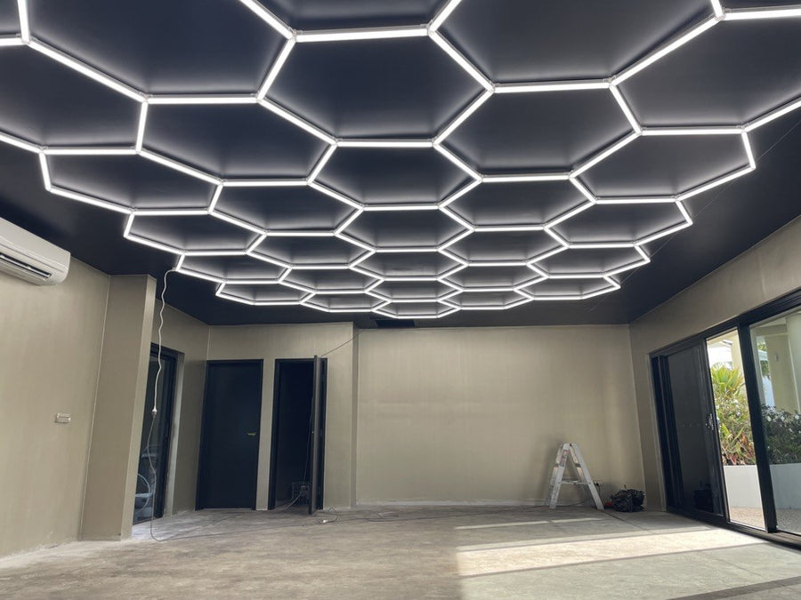 Designer Home Garage with custom hexagon LED lighting by HEXLED