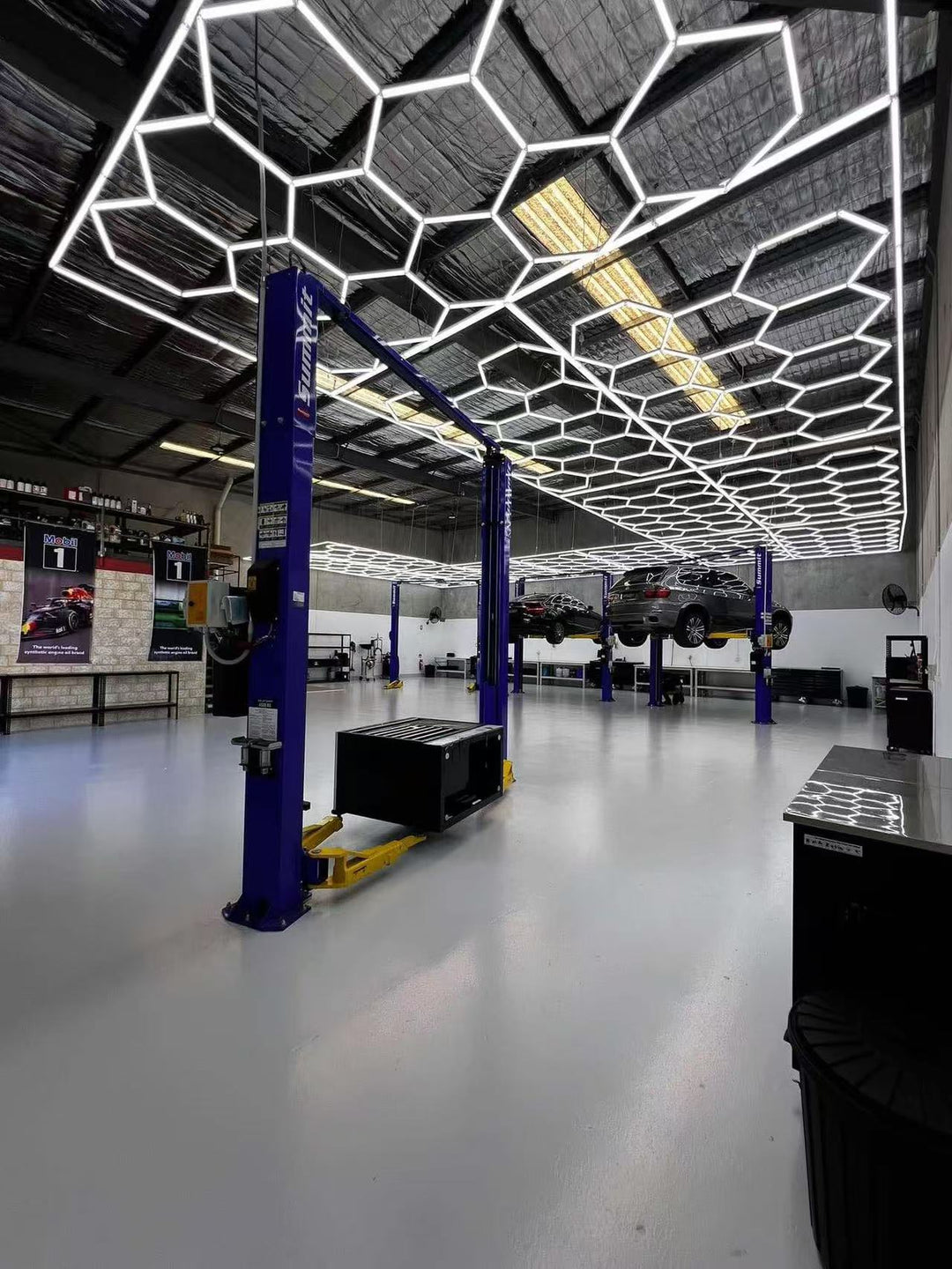 hexagonal lights in automotive shop